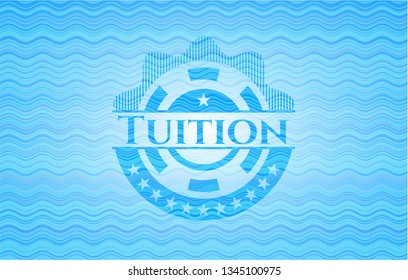 Tuition light blue water badge.