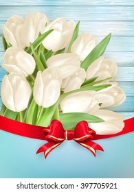 Tulip flower on turquoise painted wooden table background. Top view with copy space. EPS 10 vector file included