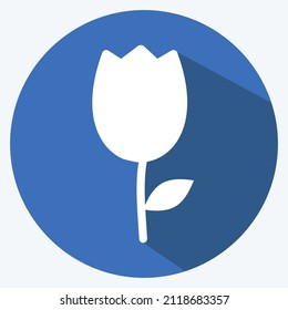 Tulip Icon in trendy long shadow style isolated on soft blue background