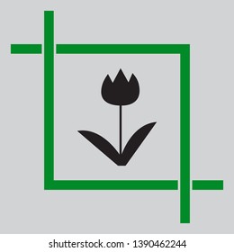 Tulip sign. Black icon inside green crop tool at light gray background
