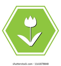 Tulip sign. Vector. White icon with black shadow at yellow green honeycomb on white background.