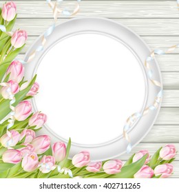 Tulips with blank picture frame on white wooden background. Romantic picture. EPS 10 vector file included