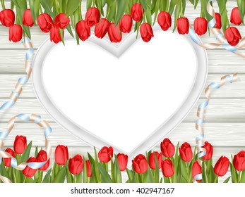 Tulips with blank white picture heart shape frame on a wooden background. Romantic picture. EPS 10 vector file included
