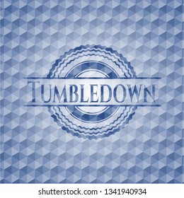 Tumbledown blue badge with geometric pattern background.