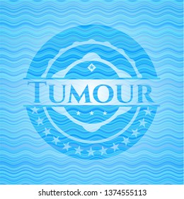 Tumour light blue water badge.