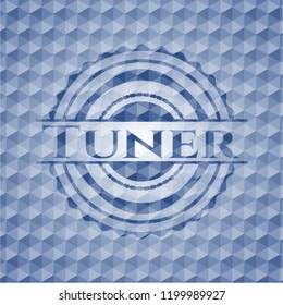 Tuner blue badge with geometric pattern.