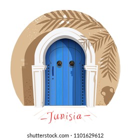 Tunisia. Wooden blue doors. Old ancient oriental or arabic doors made of wood or stone, blue and white colour traditional.