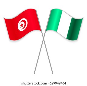 Tunisian and Nigerian crossed flags. Tunisia combined with Nigeria isolated on white. Language learning, international business or travel concept.