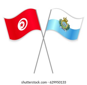 Tunisian and Sammarinese crossed flags. Tunisia combined with San Marino isolated on white. Language learning, international business or travel concept.
