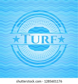 Turf sky blue water style badge.