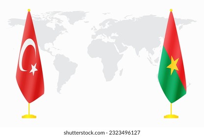 Die Flaggen der Türkei und Burkina Fasos für offizielle Treffen vor dem Hintergrund der Weltkarte.