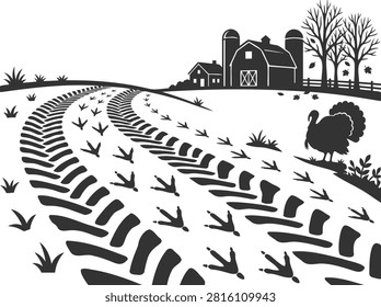 Turkey footprints on tractor tracks leading to farmstead during autumn season