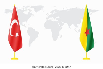 Turkey and French Guiana flags for official meeting against background of world map.