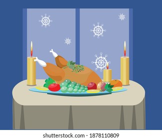 Turkey on the table. Fruit and candles on the window background.
