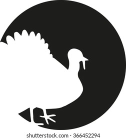 Turkey silhouette in front of moon