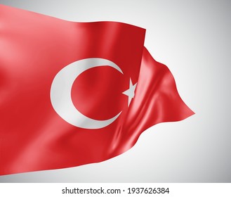 Turkey, vector flag with waves and bends waving in the wind on a white background.