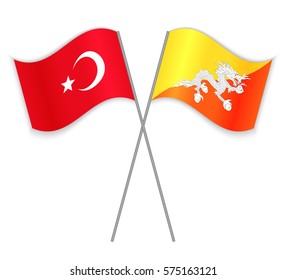 Turkish and Bhutanese crossed flags. Turkey combined with Bhutan isolated on white. Language learning, international business or travel concept.
