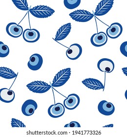 El encanto turco del mal ojo en forma de cereza. Patrón inmaculado con bayas en tonos azules para imprimir en tejidos decorativos, tejidos, papel. Gráficos vectoriales.