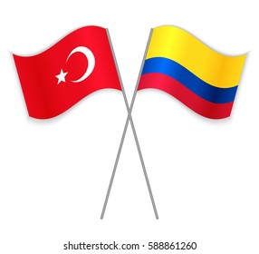 Turkish and Colombian crossed flags. Turkey combined with Colombia isolated on white. Language learning, international business or travel concept.