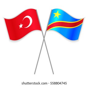 Turkish and Congolese crossed flags. Turkey combined with Democratic Republic of the Congo isolated on white. Language learning, international business or travel concept.