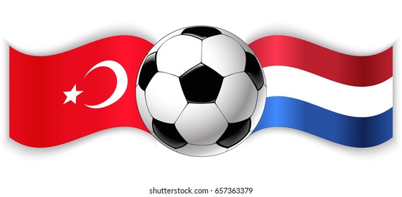 Turkish and Dutch wavy flags with football ball. Turkey combined with Netherlands isolated on white. Football match or international sport competition concept.