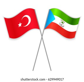 Turkish and Equatorial Guinean crossed flags. Turkey combined with Equatorial Guinea isolated on white. Language learning, international business or travel concept.