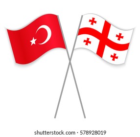 Turkish and Georgian crossed flags. Turkey combined with Georgia isolated on white. Language learning, international business or travel concept.