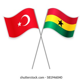 Turkish and Ghanaian crossed flags. Turkey combined with Ghana isolated on white. Language learning, international business or travel concept.