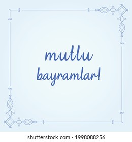 a Turkish message saying ' happy feast' to celebrate ramadan feast or feast of sacrifice and a blue decorative frame