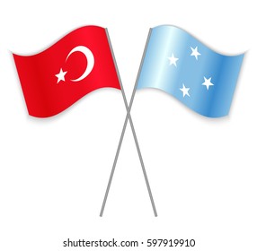 Turkish and Micronesian crossed flags. Turkey combined with Micronesia isolated on white. Language learning, international business or travel concept.