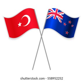 Turkish and NZ crossed flags. Turkey combined with New Zealand isolated on white. Language learning, international business or travel concept.