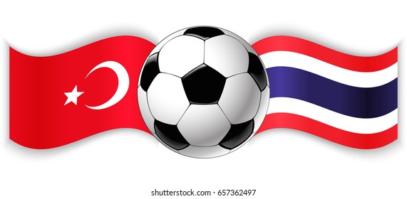Turkish and Thai wavy flags with football ball. Turkey combined with Thailand isolated on white. Football match or international sport competition concept.