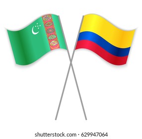 Turkmen and Colombian crossed flags. Turkmenistan combined with Colombia isolated on white. Language learning, international business or travel concept.