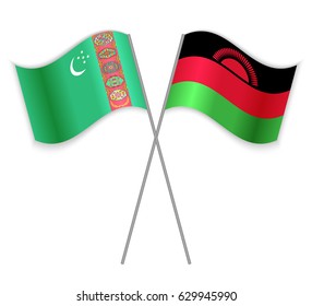 Turkmen and Malawian crossed flags. Turkmenistan combined with Malawi isolated on white. Language learning, international business or travel concept.