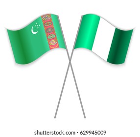 Turkmen and Nigerian crossed flags. Turkmenistan combined with Nigeria isolated on white. Language learning, international business or travel concept.