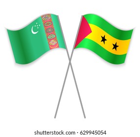 Turkmen and Sao Tomean crossed flags. Turkmenistan combined with Sao Tome and Principe isolated on white. Language learning, international business or travel concept.