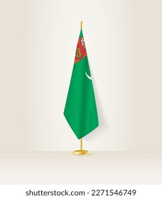 Turkmenistan Flagge auf einem Flaggenstand. Vektorgrafik.