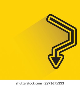 turn down arrow with shadow on yellow background