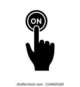 Turn on button click glyph icon. Silhouette symbol. Power. Hand pressing button. Negative space. Vector isolated illustration