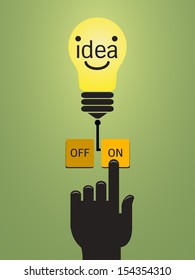 Turn on idea, representing with hand pushing on button 'on' for bright light bulb. 
