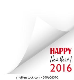 turned over white paper corner showing 2016 and text Happy New Year