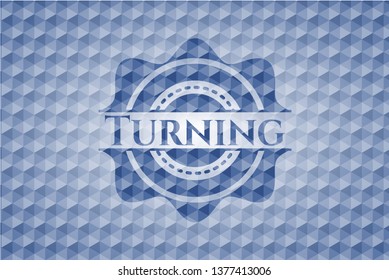 Turning blue polygonal badge.