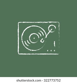 Turntable hand drawn in chalk on a blackboard vector white icon isolated on a green background.