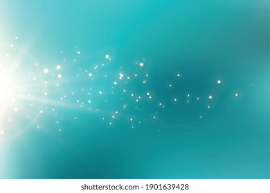 turquoise background with sparkling light flare effect