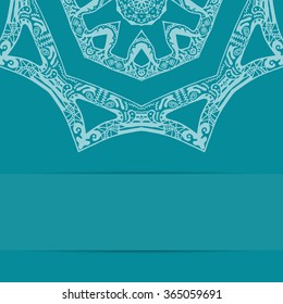 Turquoise blue card with ornate pattern and copy space