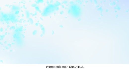Turquoise flower petals falling down. Lively romantic flowers falling rain. Flying petal on blue sky wide background. Love, romance concept. Delightful wedding invitation.
