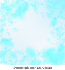 Turquoise flower petals falling down. Authentic romantic flowers vignette. Flying petal on blue sky square background. Love, romance concept. Dazzling wedding invitation.