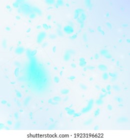 Turquoise flower petals falling down. Symmetrical romantic flowers falling rain. Flying petal on blue sky square background. Love, romance concept. Beautiful wedding invitation.
