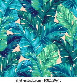 turquoise and green tropical leaves. Seamless graphic design with amazing palms. Fashion, interior, wrapping, packaging suitable. Realistic palm leaves. Vertical layout. leaves growing upwards. 