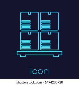 Turquoise line Cardboard boxes on pallet icon isolated on blue background. Closed carton delivery packaging box with fragile signs.  Vector Illustration